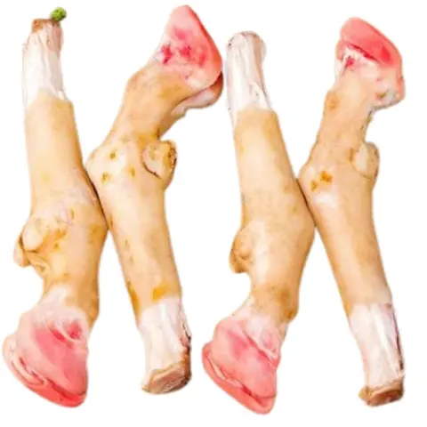 Meat delivery Dubai: Fresh, tender raw meat cuts on a wooden board, ready for cooking, with herbs and spices on the side.