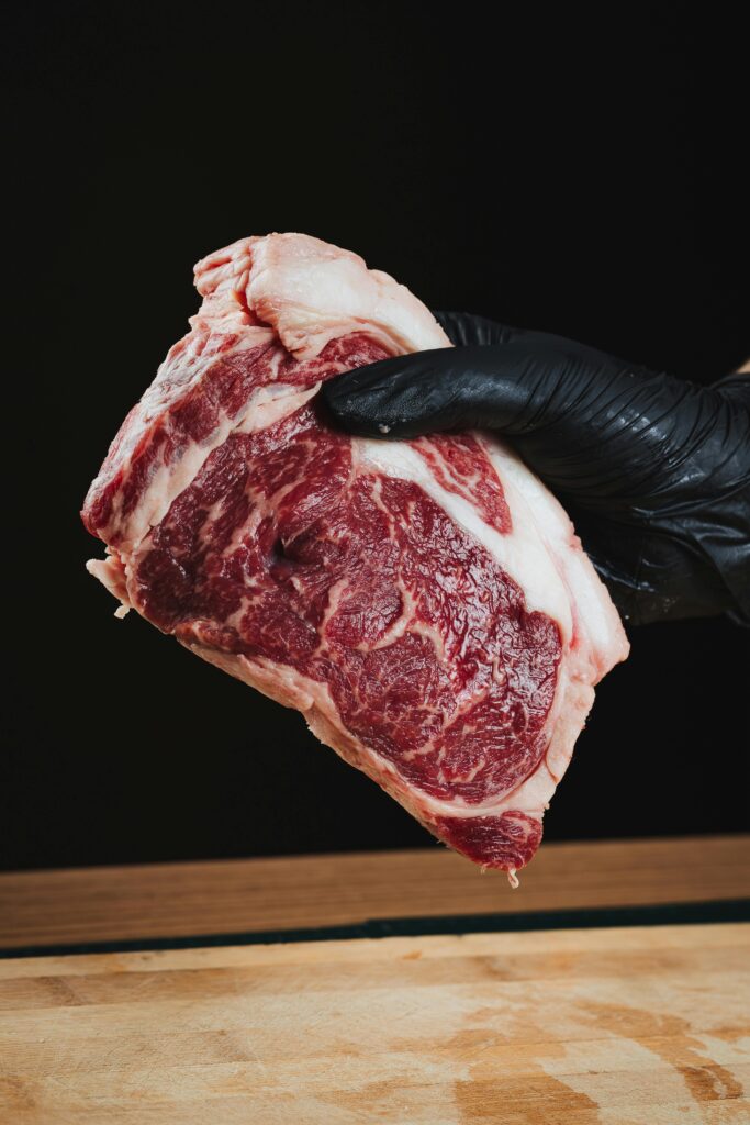 Fresh pork cuts neatly displayed in a specialty Dubai store, showcasing premium quality and variety for non-Muslim customers.