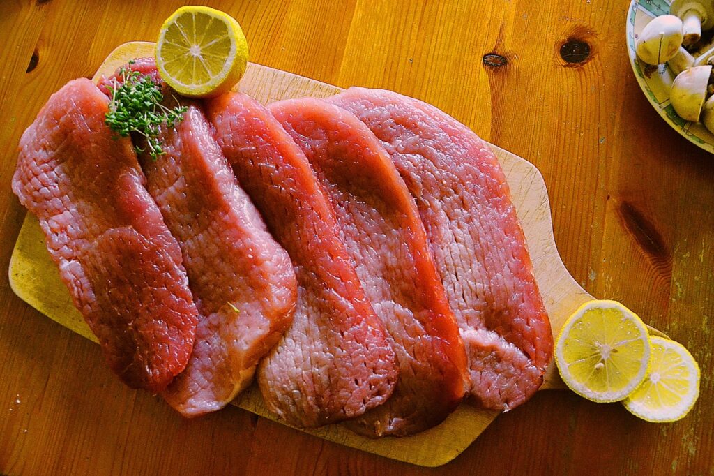 High-quality fresh meat in Dubai, neatly displayed at a local butcher shop with premium cuts of beef, lamb, and chicken.